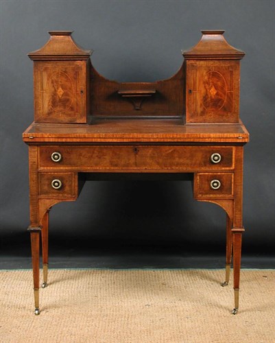 Lot 903 - An Edwardian 'fiddle back' mahogany bonheur du jour, circa 1910