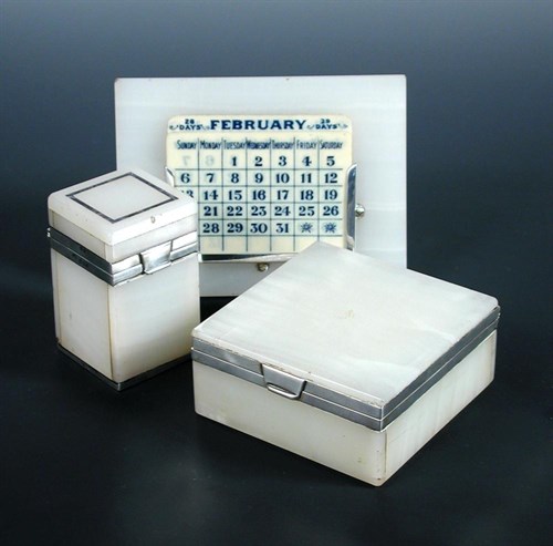 Lot 365 - An Art Deco onyx and silver mounted desk set