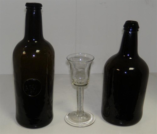 Lot 101 - An 18th century soda wine glass together with two 19th century glass bottles