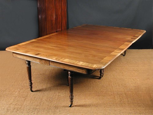Lot 883 - A Regency mahogany dining table, circa 1820