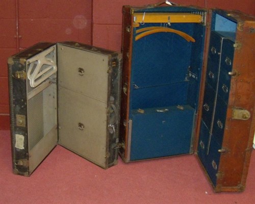 Lot 650 - An Oshkosh blue steamer suitcase and a steamer trunk by Pukka