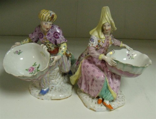 Lot 38 - A pair of 19th century Meissen sweetmeats held by a Turk and companion