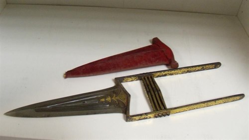 Lot 718 - A 19th century Indian katar push dagger in red velvet scabbard