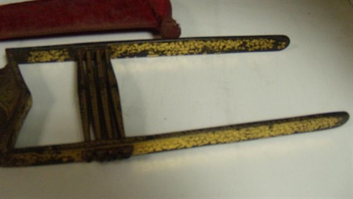 Lot 718 - A 19th century Indian katar push dagger in red velvet scabbard