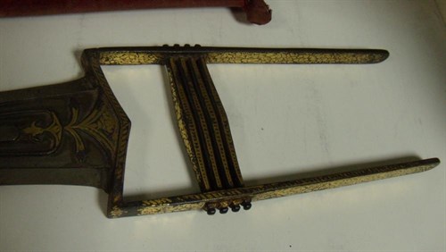 Lot 718 - A 19th century Indian katar push dagger in red velvet scabbard