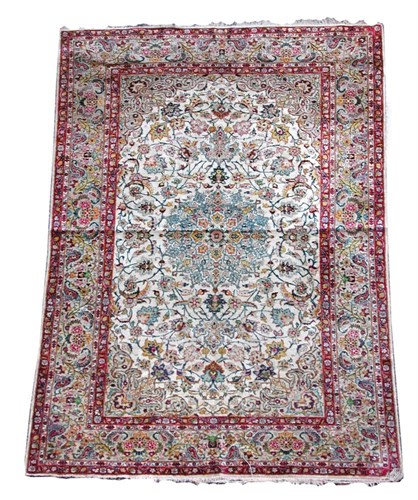 Lot 935 - A Kashan silk rug
