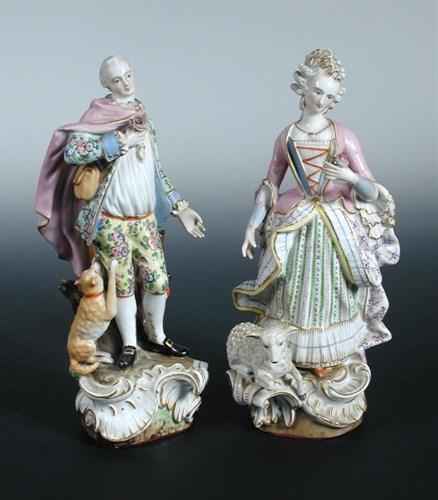 Lot 33 - A pair of late 19th century Dresden figures of a shepherd and shepherdess