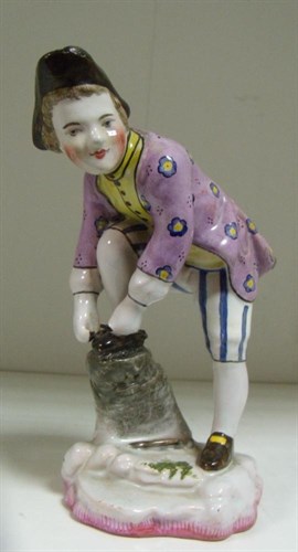 Lot 56 - An 18th century Paul Hannong faience figure of a skater, probably Strasbourg