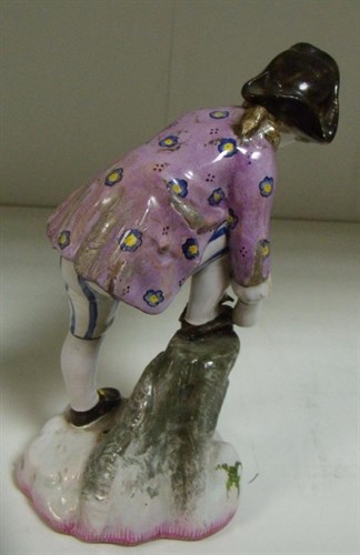 Lot 56 - An 18th century Paul Hannong faience figure of a skater, probably Strasbourg