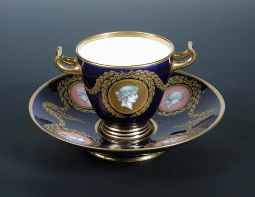 Lot 28 - A Kerr and Binns Worcester two handled cabinet cup and saucer