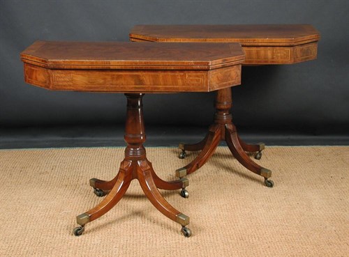 Lot 878 - A pair of Regency mahogany pedestal card tables, circa 1810