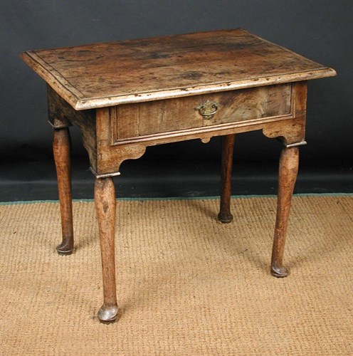 Lot 799 - An early 18th Century walnut side table, circa 1710