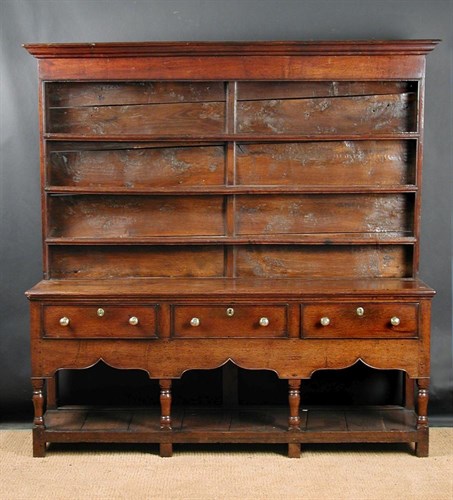 Lot 803 - A George III oak and elm dresser, circa 1770