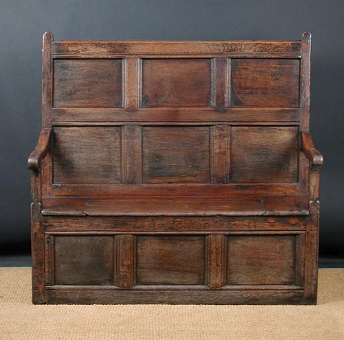 Lot 805 - A late 17th century oak settle