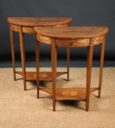 Lot 848 - A pair of Sheraton revival satinwood console tables, circa 1910