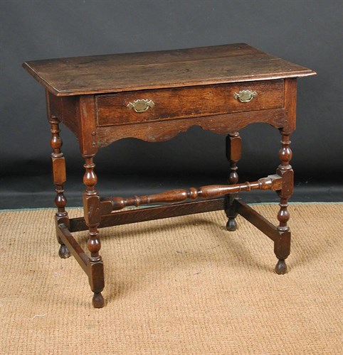 Lot 810 - An early 18th century oak side table