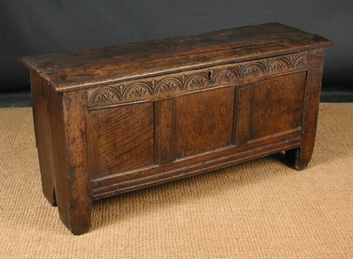 Lot 815 - A 17th century oak panelled chest