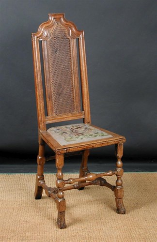 Lot 816 - A James II oak high back chair
