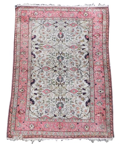 Lot 946 - A small Turkish wool and silk rug
