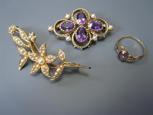 Lot 140 - A seed pearl brooch together with an amethyst and seed pearl brooch and an amethyst ring