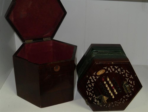 Lot 648 - A Louis Lachenal 48 key concertina in a mahogany box
