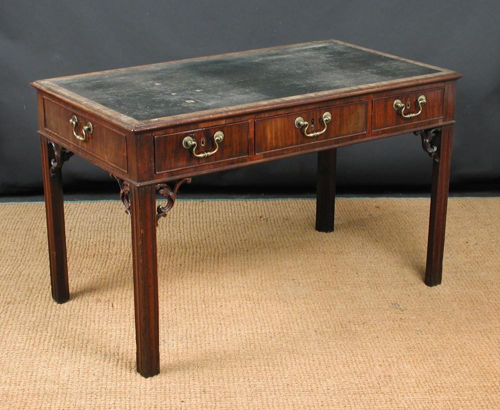 Lot 879 - A George II mahogany library table, circa