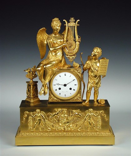 Lot 272 - An Empire ormolu mantel clock