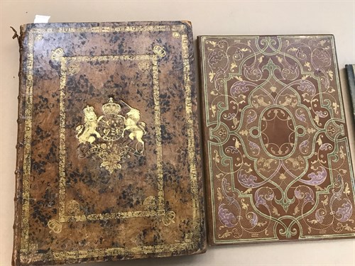 Lot 156 - An 18th century leather binding, later used as...