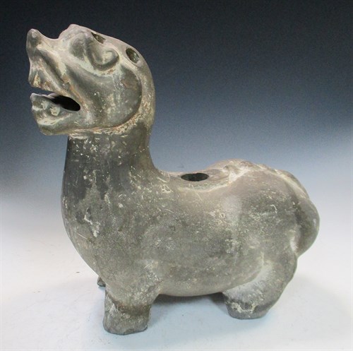 Lot 259 - A Five Dynasties grey pottery figure of a lion
