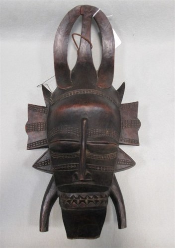 Lot 145 - An African tribal carved wood mask