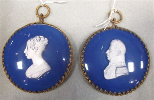 Lot 277 - A pair of 1830s blue opaline ground sulphide pendant plaques of the Duc and Duchesse Du Berri, probably Baccarat