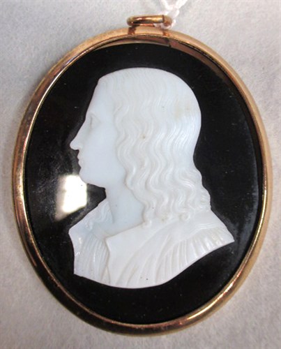 Lot 293 - A mid 19th century white glass paste profile of Raphael