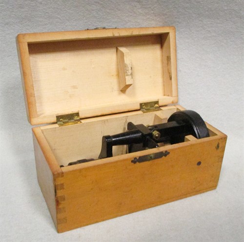 Lot 113 - A small basic microscope with black finish,...
