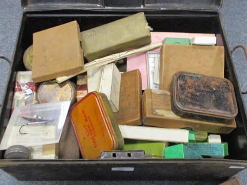 Lot 173 - A tin containing a quantity of fishing flies and other similar items
