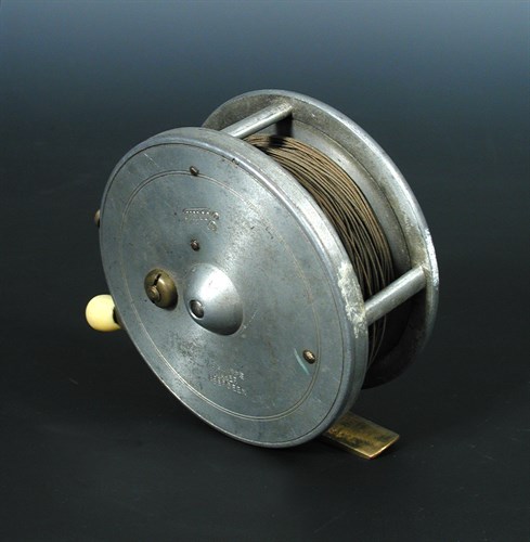 Lot 180 - J S Sharpe, Aberdeen, Scottie 4" fly reel with aluminium body, ivorine handles and on brass foot