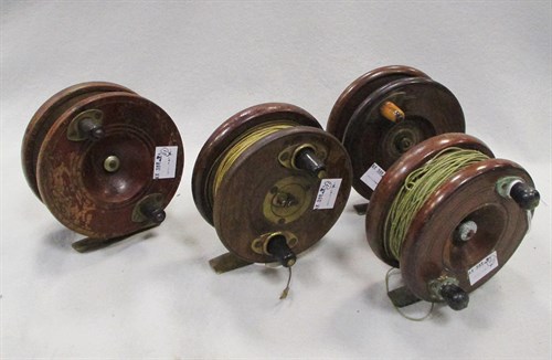 Lot 207 - Four mahogany reels
