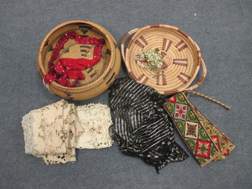 Lot 222 - A collecton of North American baskets, lace, a...