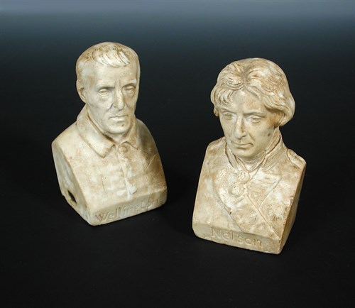 Lot 259 - A pair of mid 19th century waxed plaster busts...