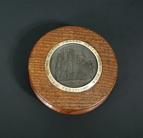 Lot 262 - A York Minster 1829 circular oak snuff box...