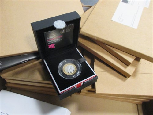 Lot 29 - Sixteen Royal Mint 2012 Olympic 50 pence,...