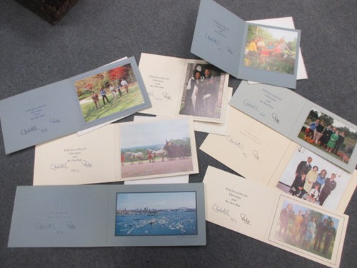 Lot 127 - Eight HM Queen Elizabeth II and HRH Prince Philip, Duke of Edinburgh,  signed Christmas cards