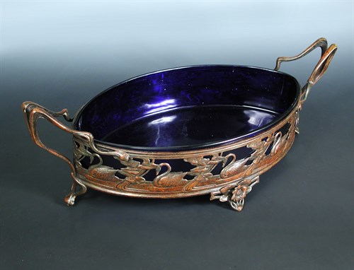 Lot 86 - A Continental twin-handled centrepiece, the...