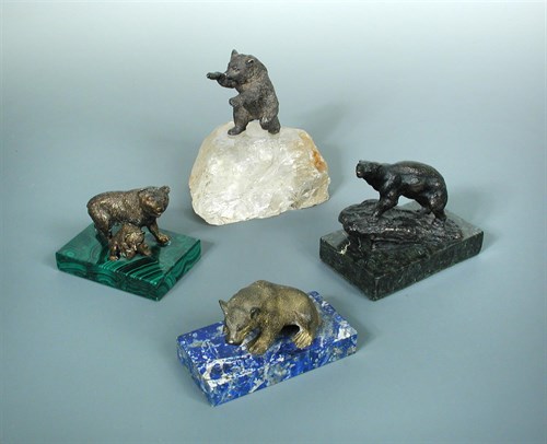 Lot 42 - A bronze model of a Polar bear walking up a...