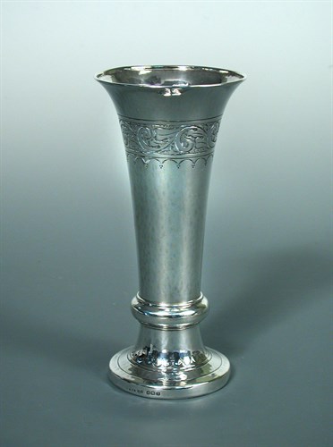 Lot 101 - Liberty & Co., an Arts & Crafts style silver spill vase
