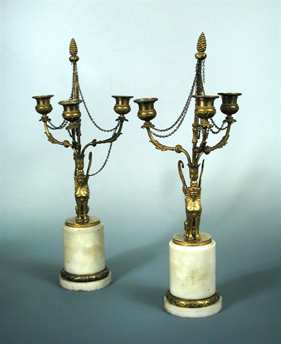 Lot 274 - A pair of early 19th century French gilt bronze three light candelabra