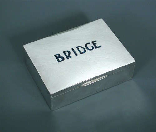 Lot 103 - Attributed to Archibald Knox for Liberty & Co., a Cymric silver and enamel Bridge box