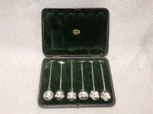 Lot 105 - Liberty & Co., a cased set of six silver spoons