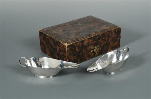 Lot 123 - A pair of Art Deco silver asparagus butter boats by S. Blanckensee & Son Ltd.
