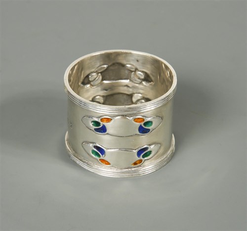 Lot 111 - Liberty & Co., a silver and enamel napkin ring
