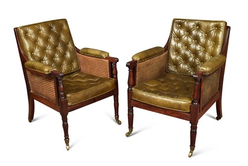 Lot 382 - A matched pair of Regency mahogany library bergeres